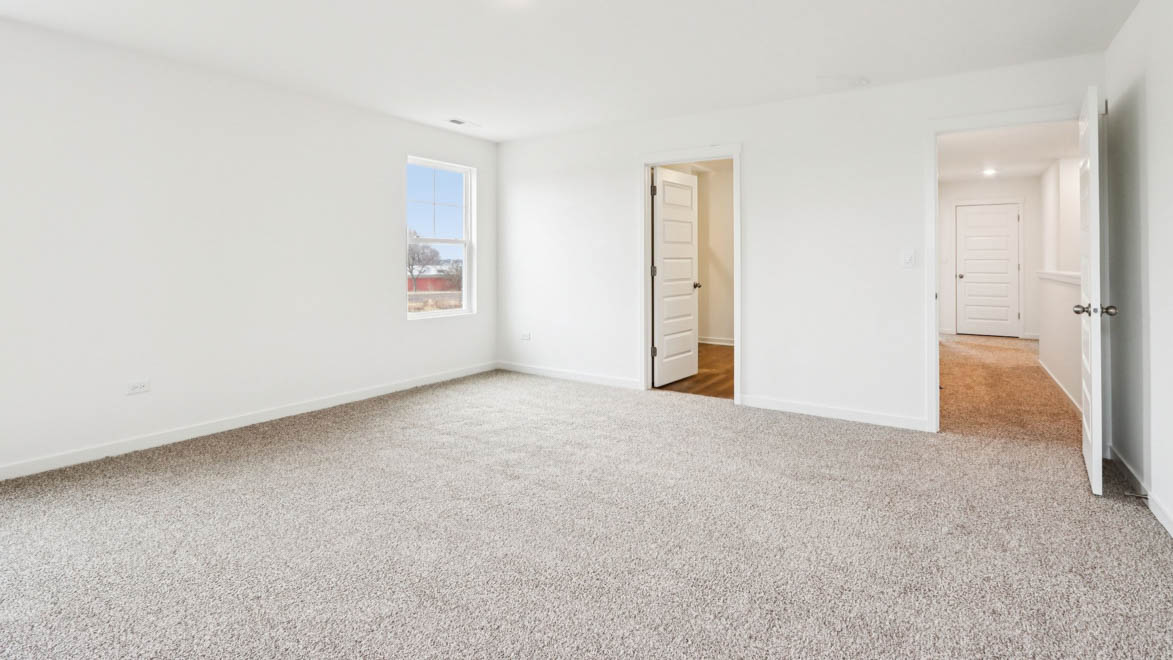 primary bedroom with connecting en suite
