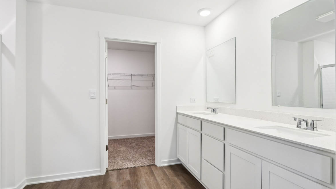 primary bathroom with dual sink