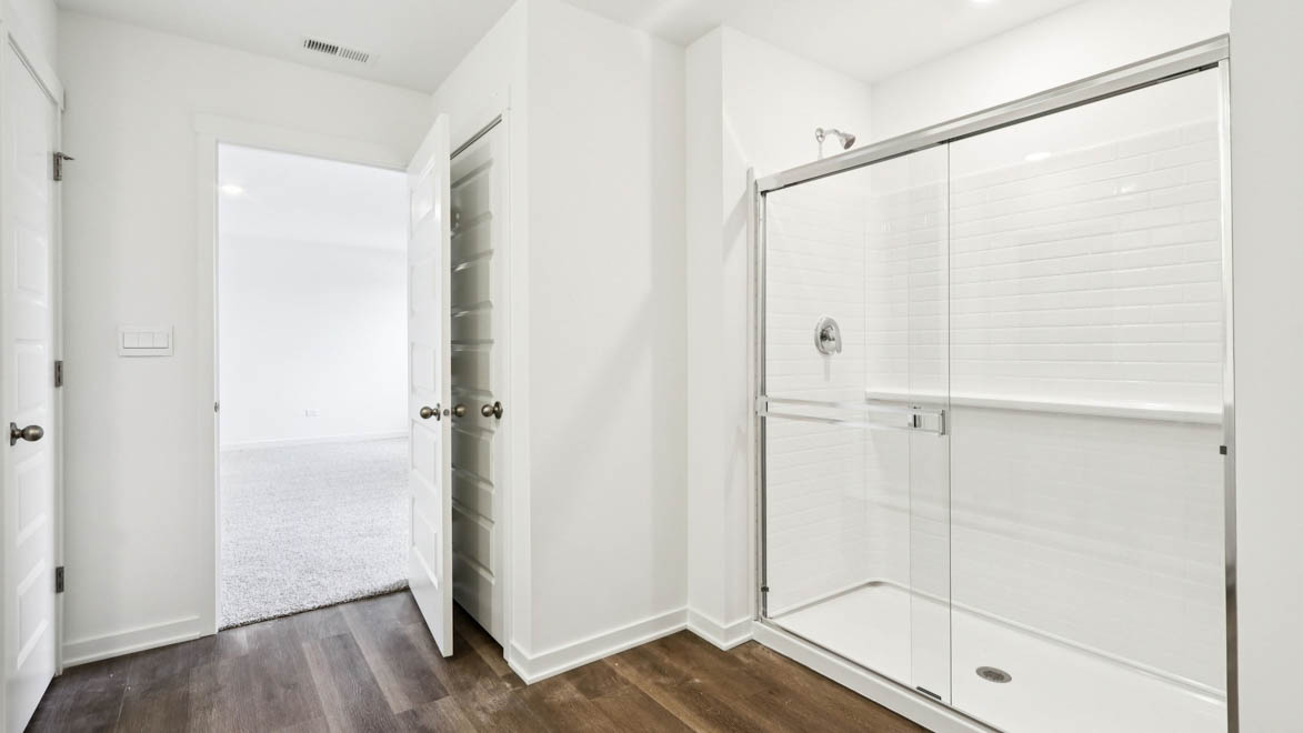 primary bathroom with walk in shower
