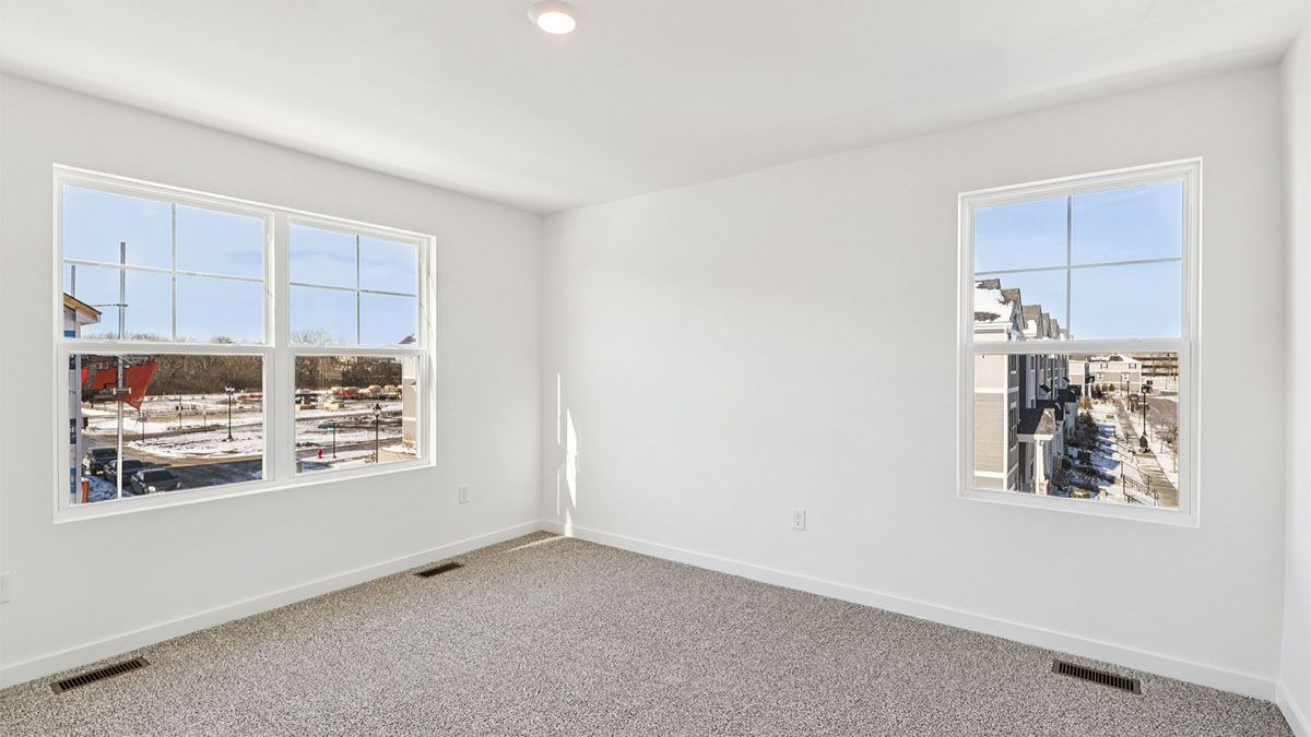 primary bedroom with large window