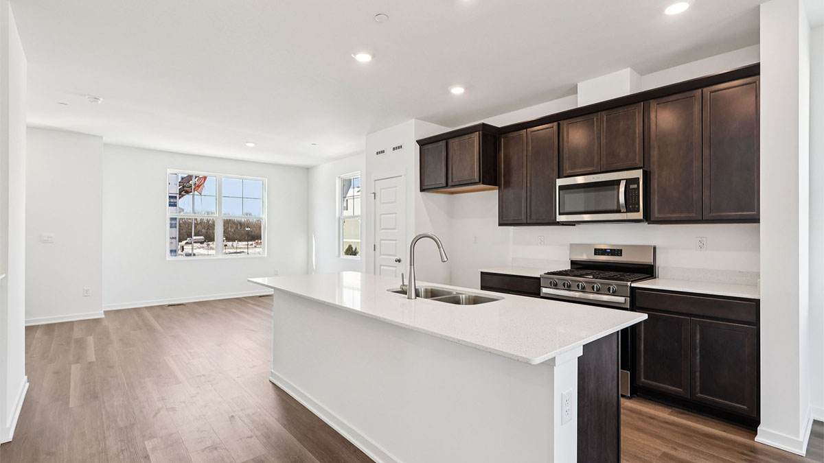 kitchen with quartz countertops and flagstone cabinets