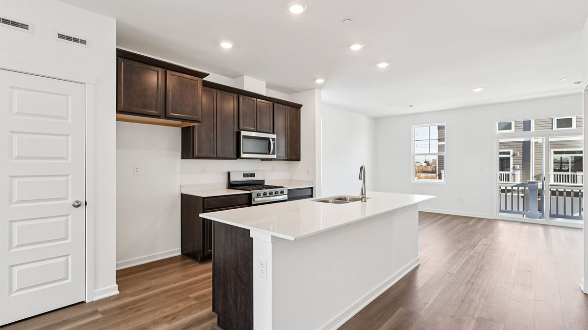 kitchen with quartz countertops and flagstone cabinets