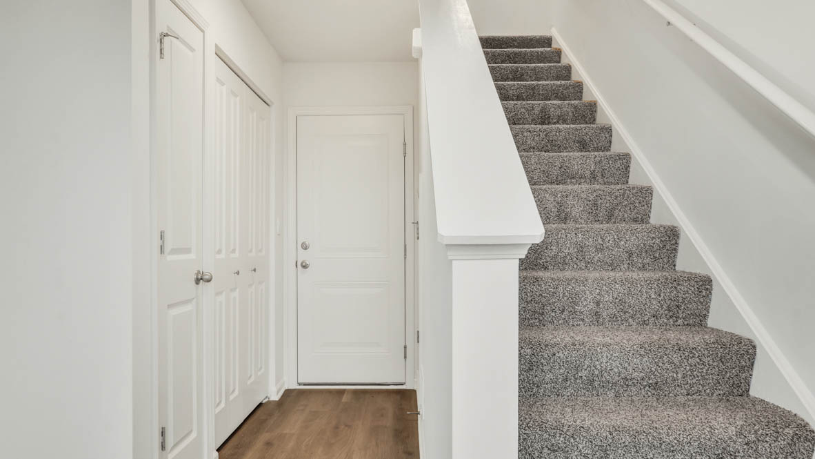 Ground level entrance to staircase and bonus room