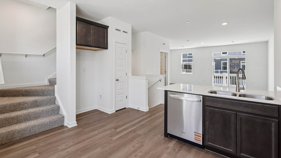 open-concept kitchen with flagstone cabinets