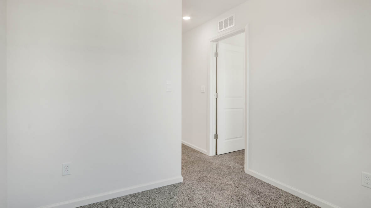 Upper level hallway to loft and bedroom number 2