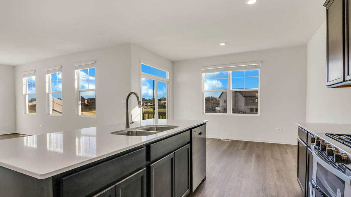 Kitchen with large island overlooking great room