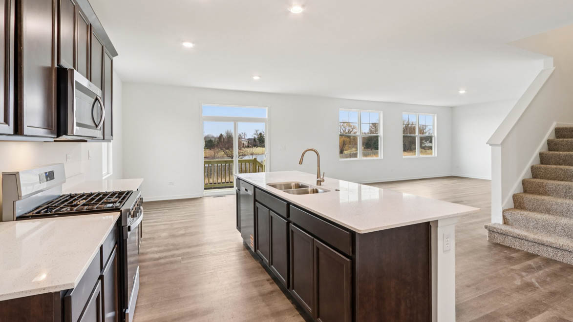 hallway to spacious kitchen