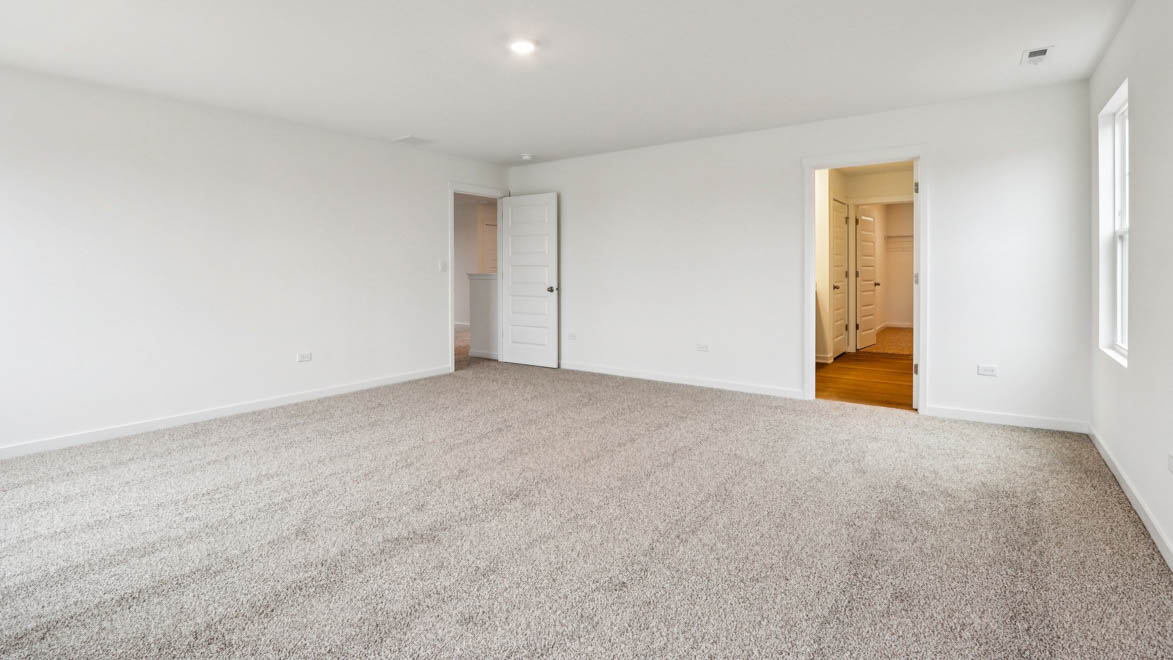 primary bedroom with connecting en suite