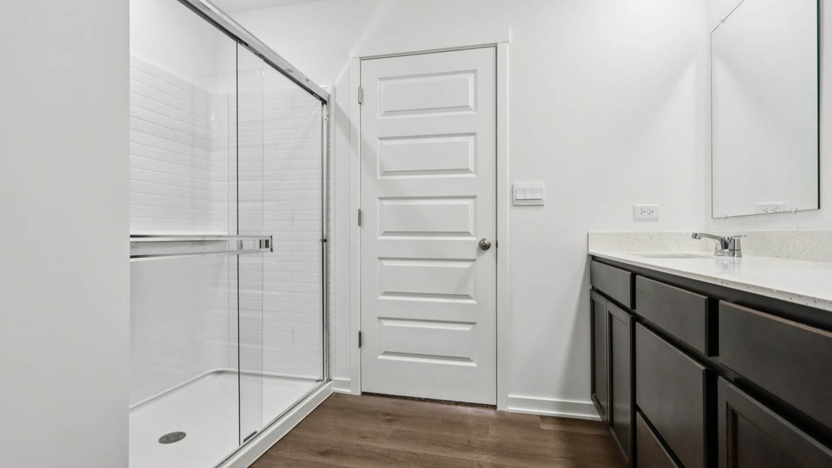 primary bathroom with walk in shower
