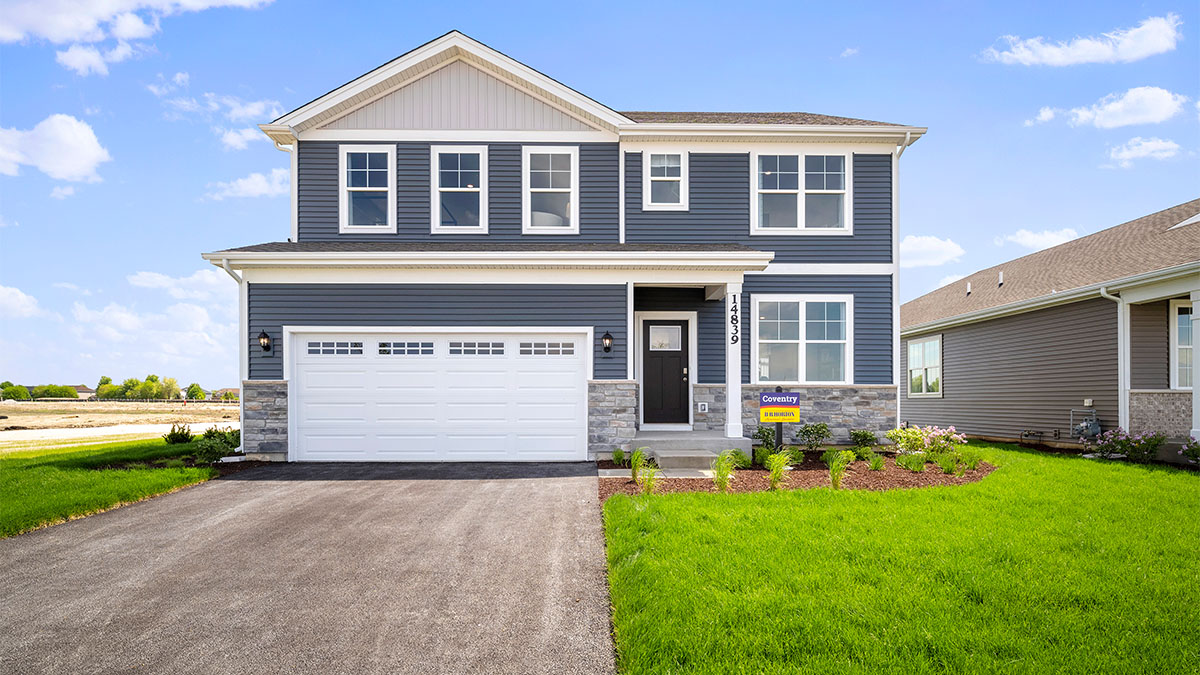 Greenbriar model exterior with stone accents and grey vinyl siding