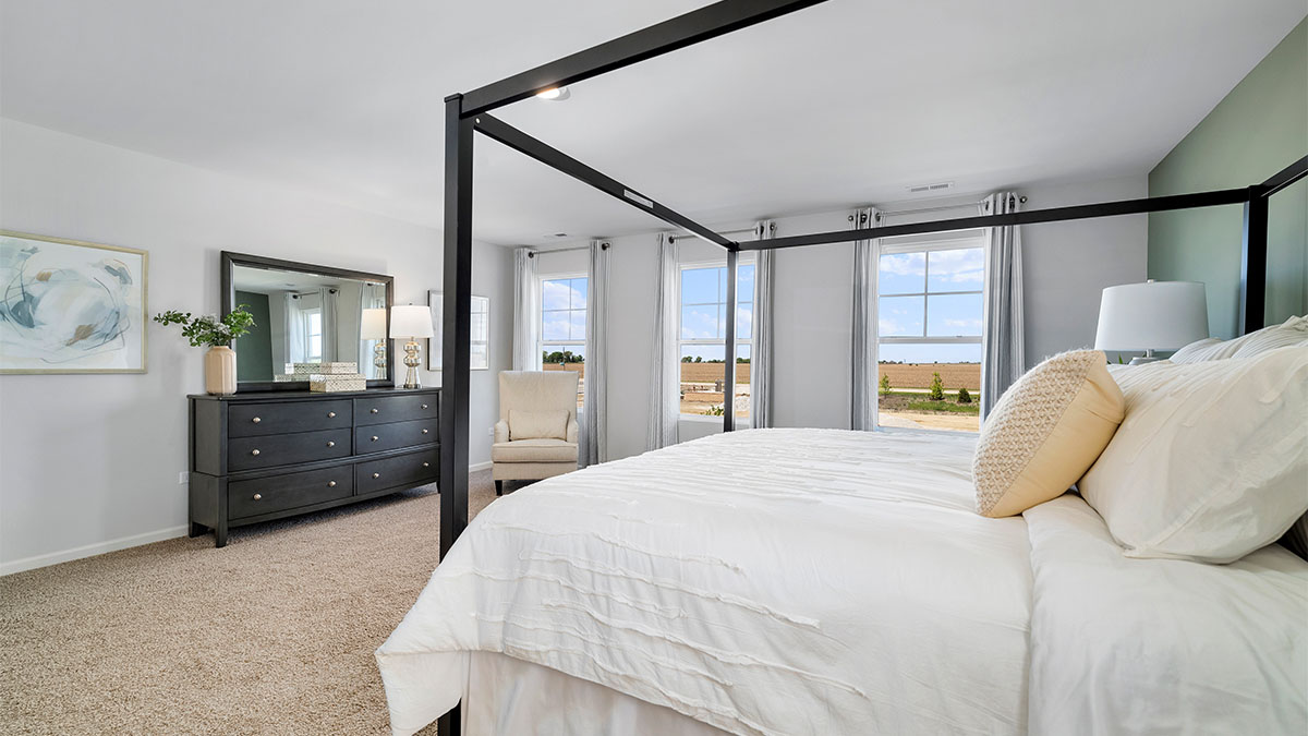 Primary bedroom with connecting en suite