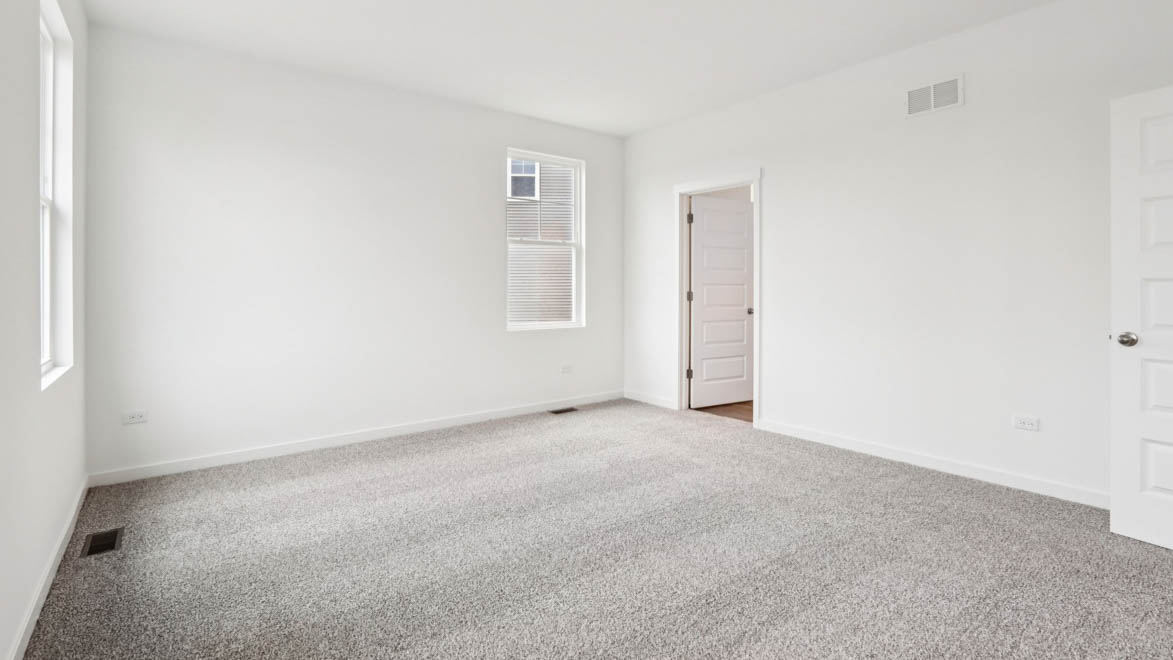 primary bedroom with connecting en suite