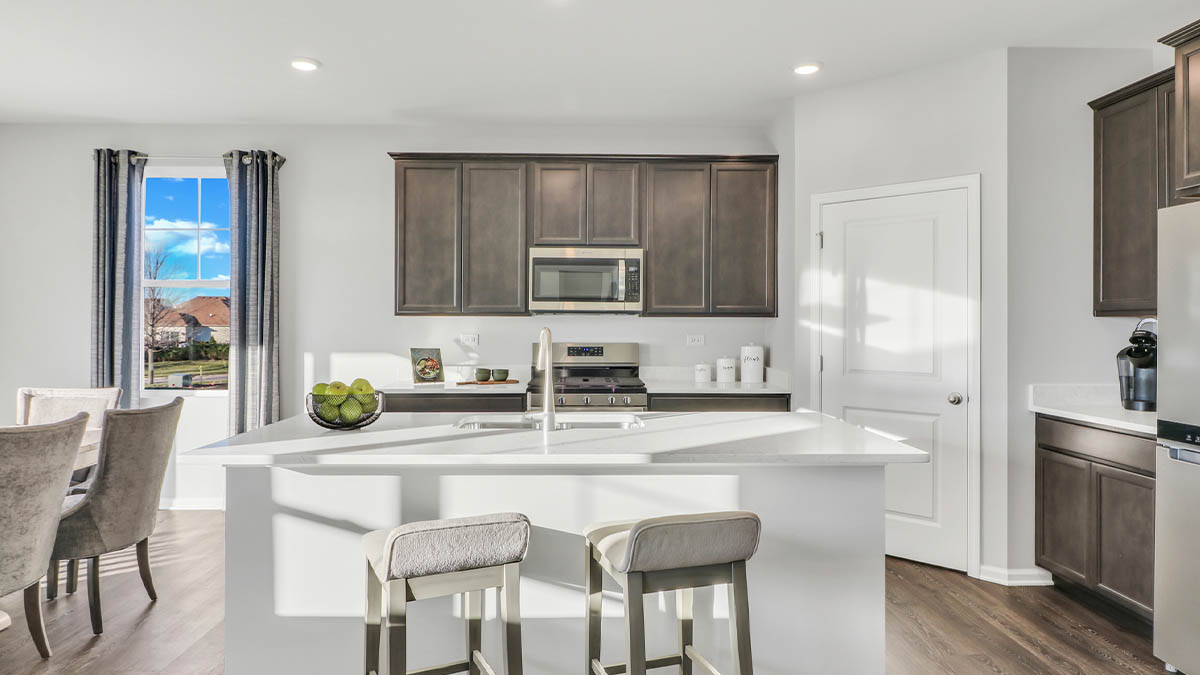 open concept kitchen with flagstone cabinets