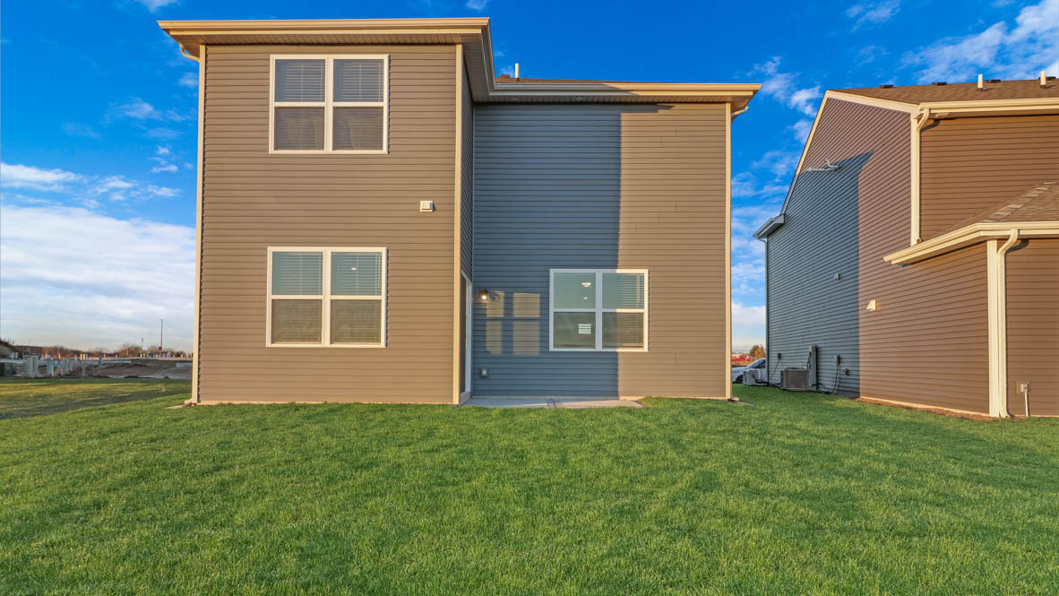 back side of home with patio space