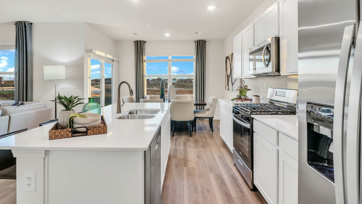 open concept kitchen with stainless steel appliances
