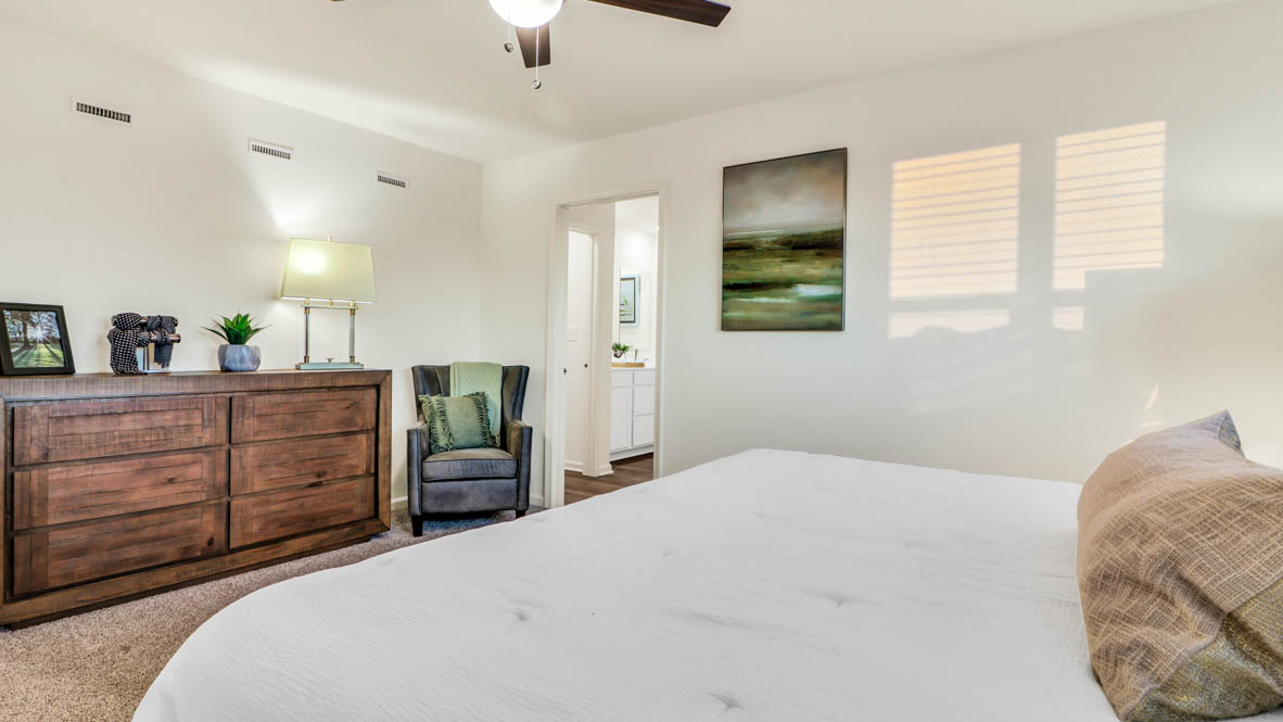 primary suite with attached bathroom