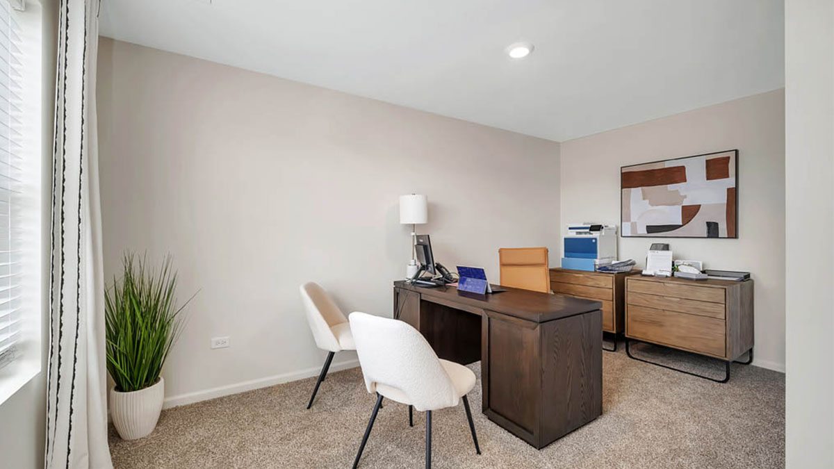 Bedroom posed as an office.