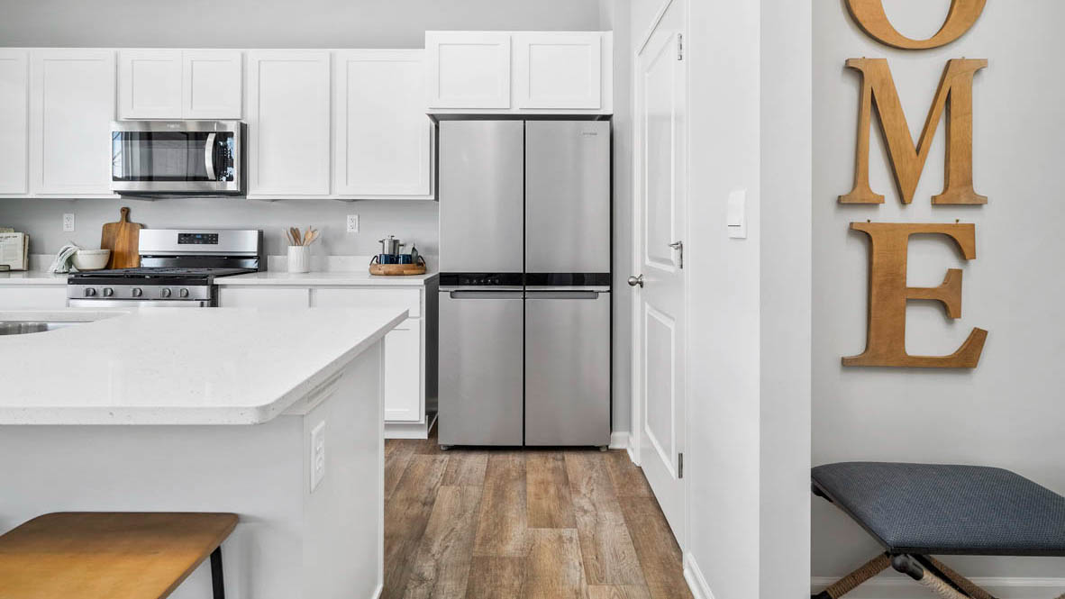 Kitchen with stainless steel appliances.