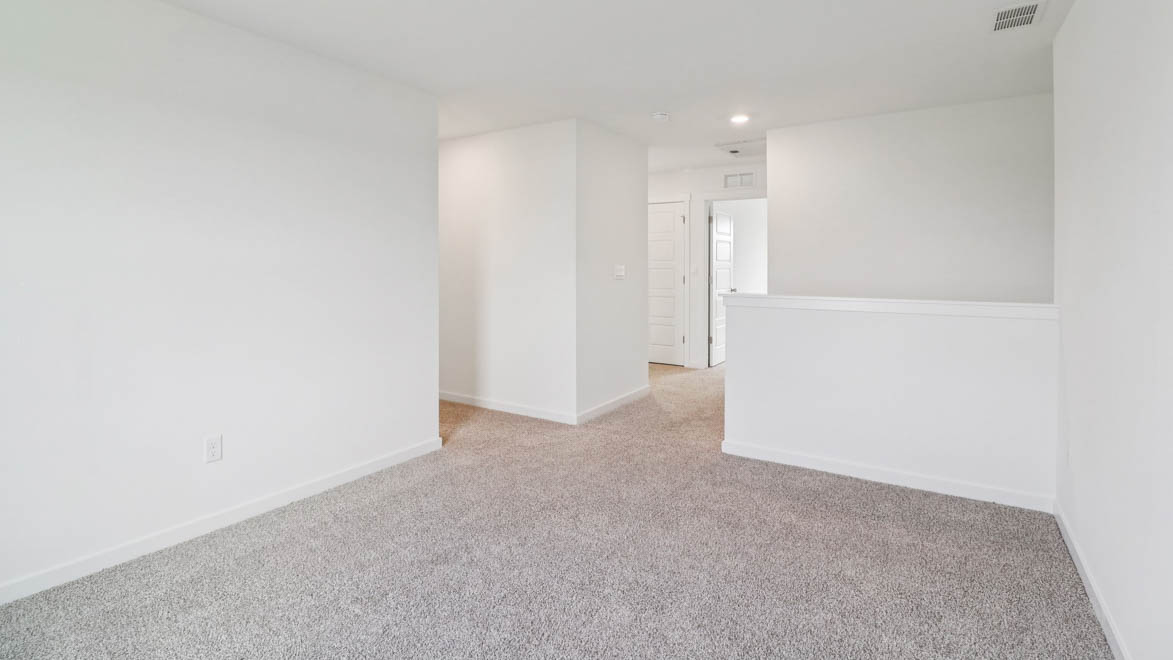 carpeted loft area