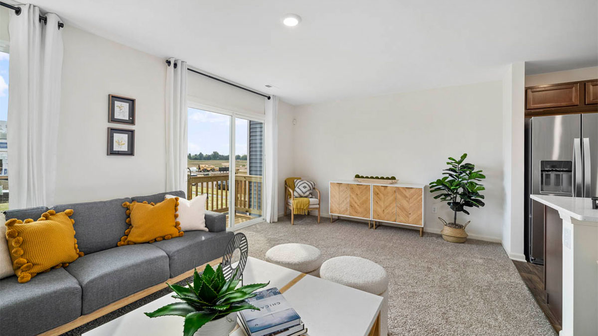 living room with carpet and glass door walk out