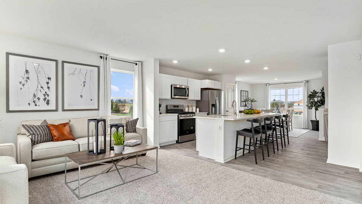 spacious living room with kitchen view