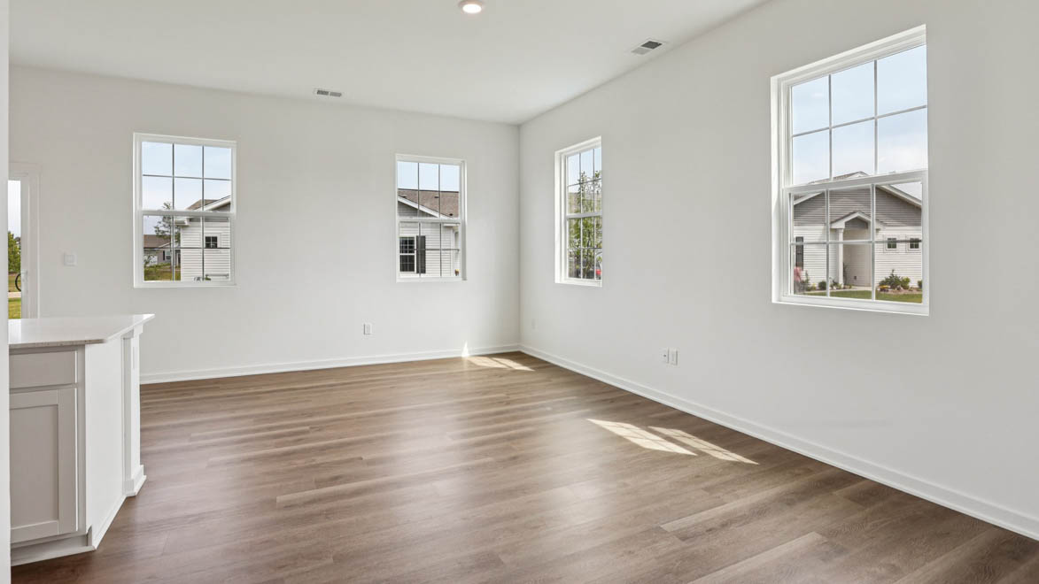 Entry hallway leads from front porch to open concept designed flex and living spaces, outside access Stonewater