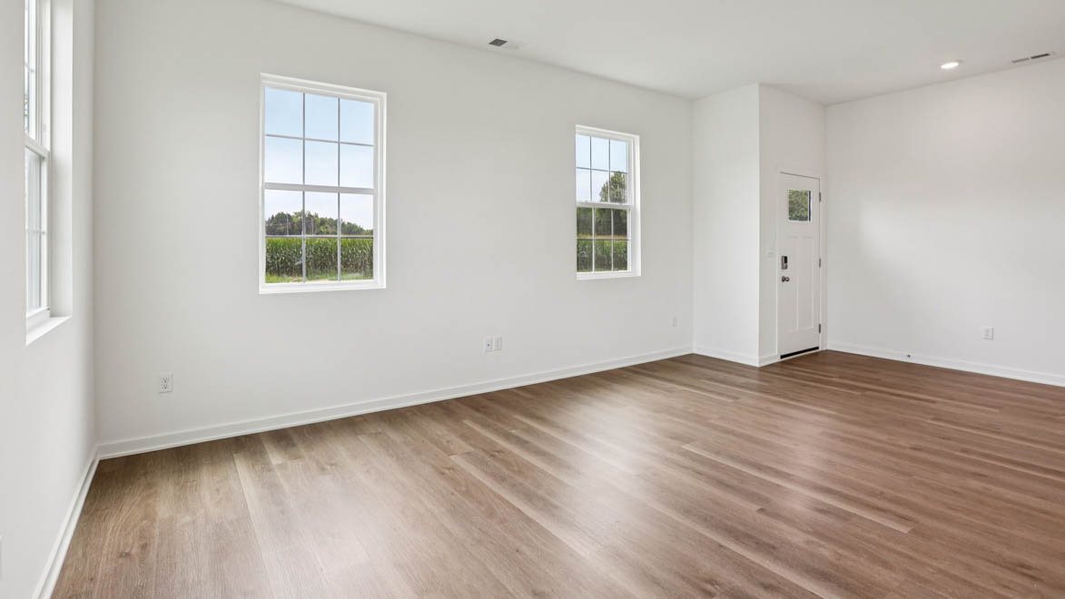 Dining area in Stonewater is ready for entertaining, or everyday living in the kitchen, living room, upstairs access