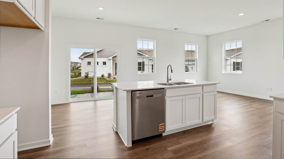 Central kitchen island with sink, seating, crafted to anchor the home, pantry, prep zones, perfect for entertaining and everyday gathering