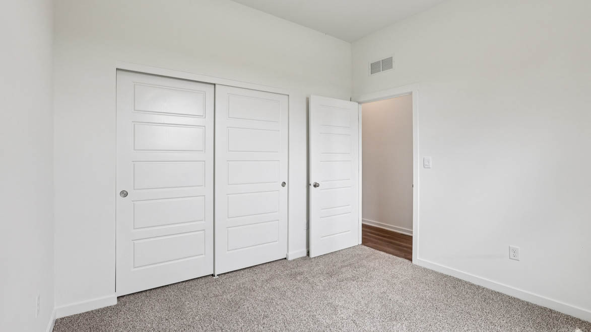 Second bedroom, flex-office, study, entertainment, game, craft room options in this D.R. Horton new construction home