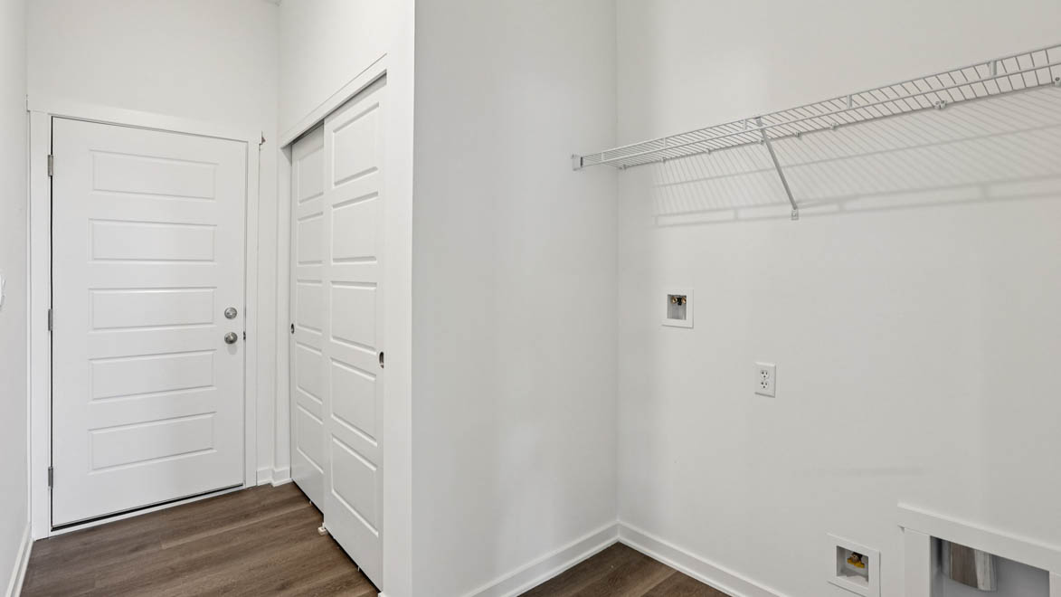 New home primary walk-in closet adds crafty organized space designed by D.R. Horton in Stonewater