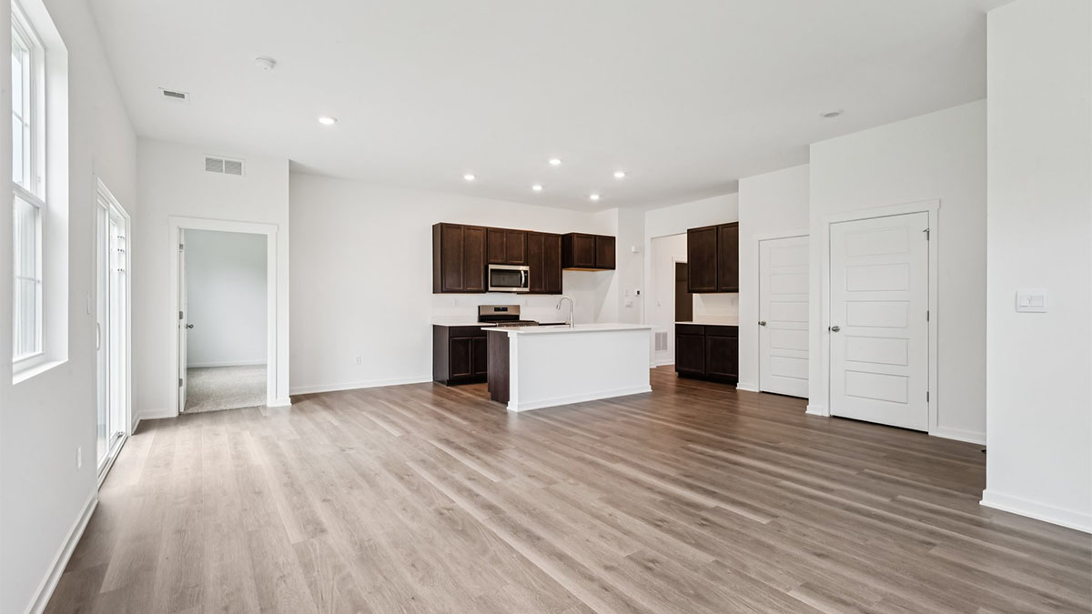 Central kitchen island with sink, seating, crafted to anchor the home, pantry, prep zones, perfect for entertaining and everyday gathering