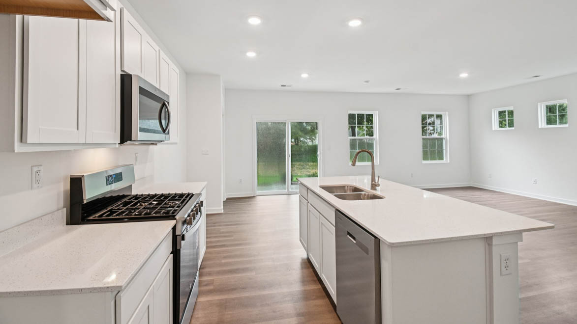 New appliances included, with our kitchen island, a sink, seating that anchor our kitchen, pantry, near dining, living rooms