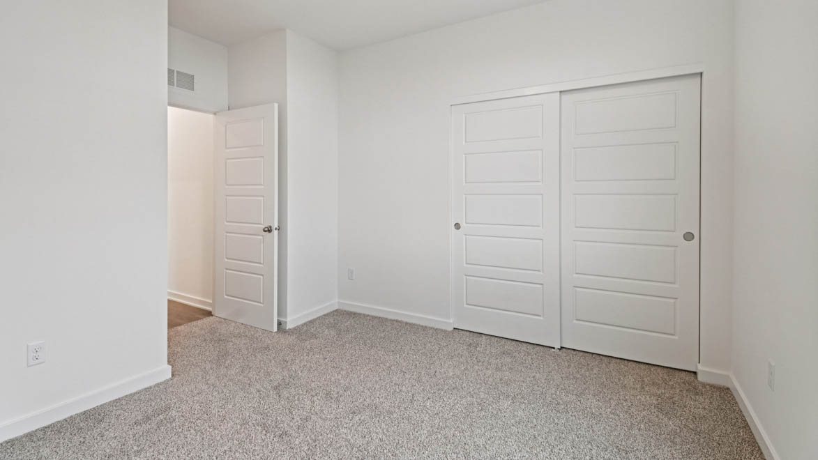 Second bedroom, flex-office, study, entertainment, game, craft room options in this D.R. Horton new construction home