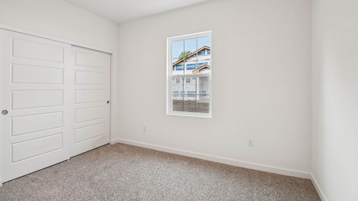 Second bedroom, flex-office, study, entertainment, game, craft room in this new construction D.R. Horton home