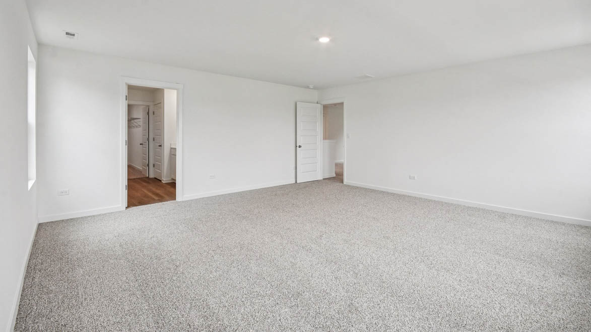 Primary bedroom wit connecting en suite