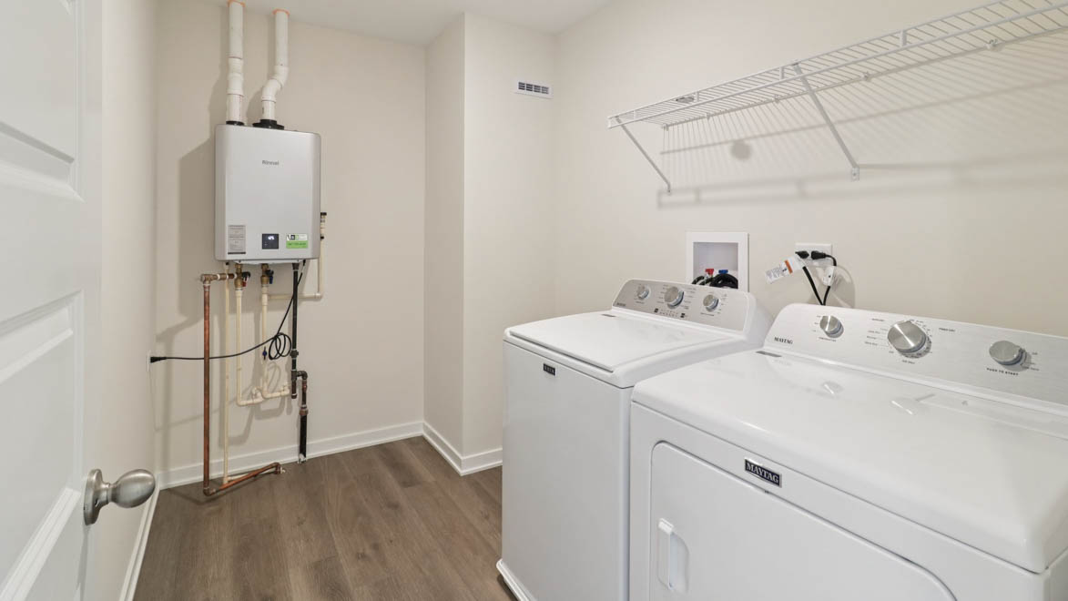 laundry room with side by side washer and dryer