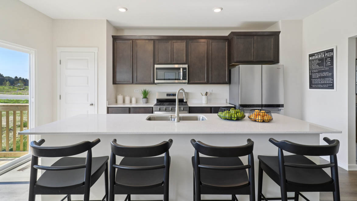 Kitchen with sliding door to backyard