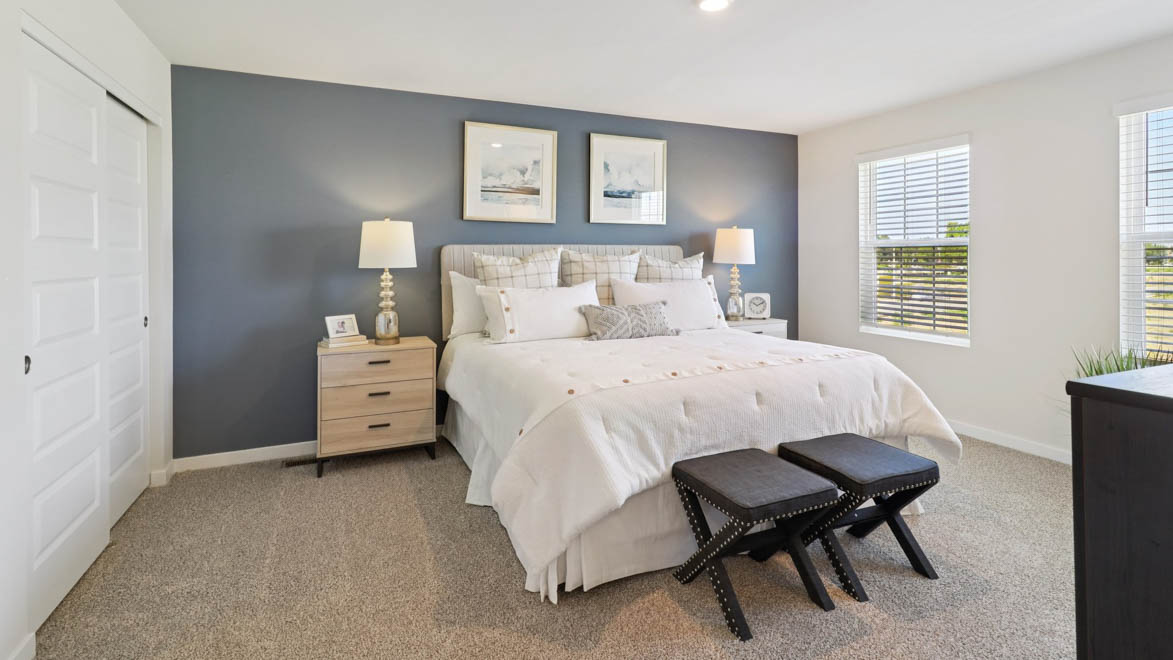 Upstairs primary bedroom with connecting en suite