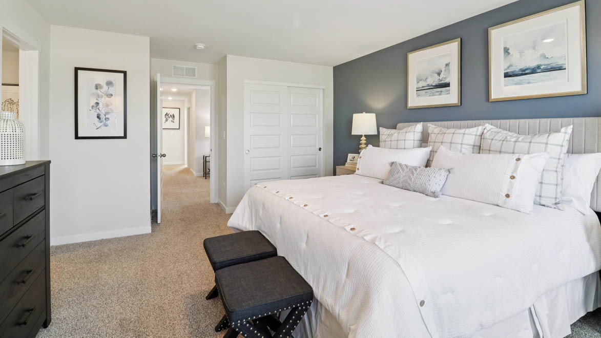 Primary bedroom off of loft