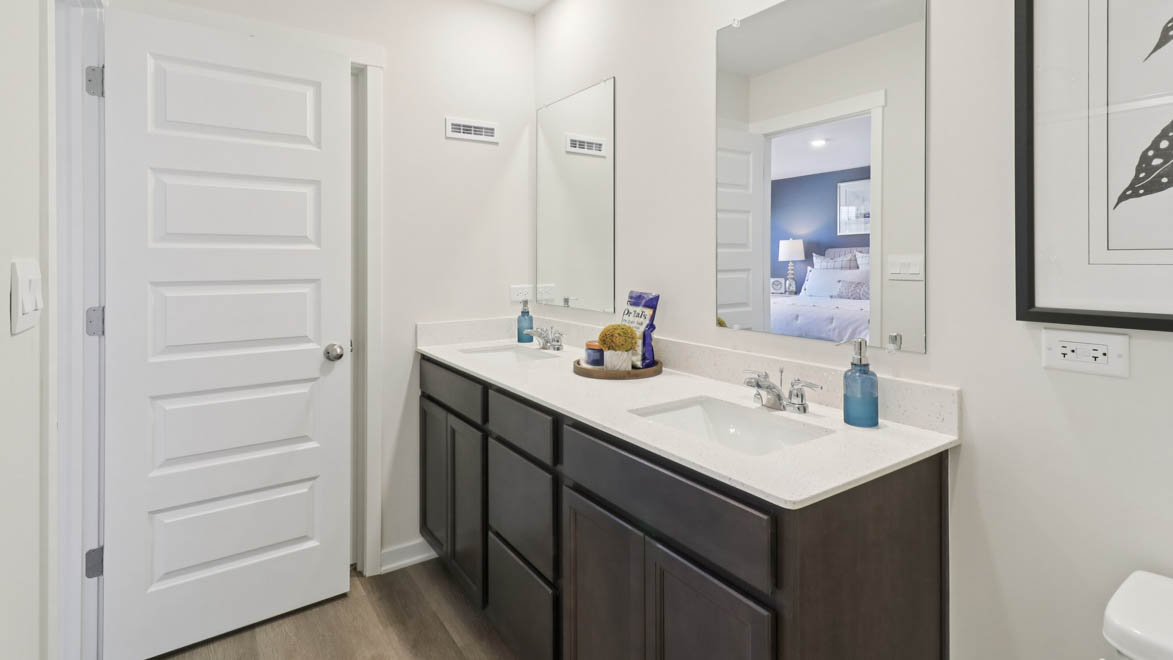 primary bathroom with dual sinks