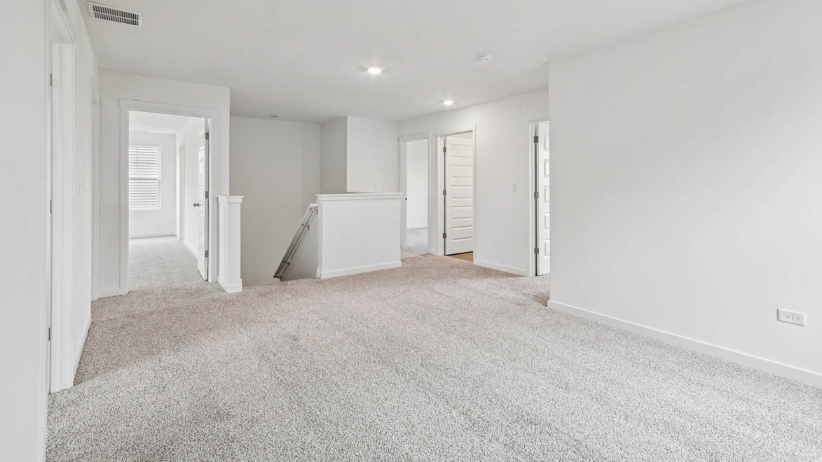 Loft area with full carpet