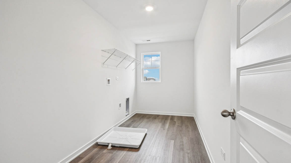 Upstairs laundry room with window