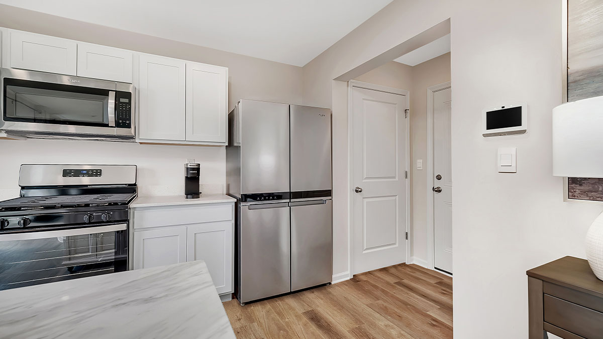 open concept kitchen with access to the 2-car garage