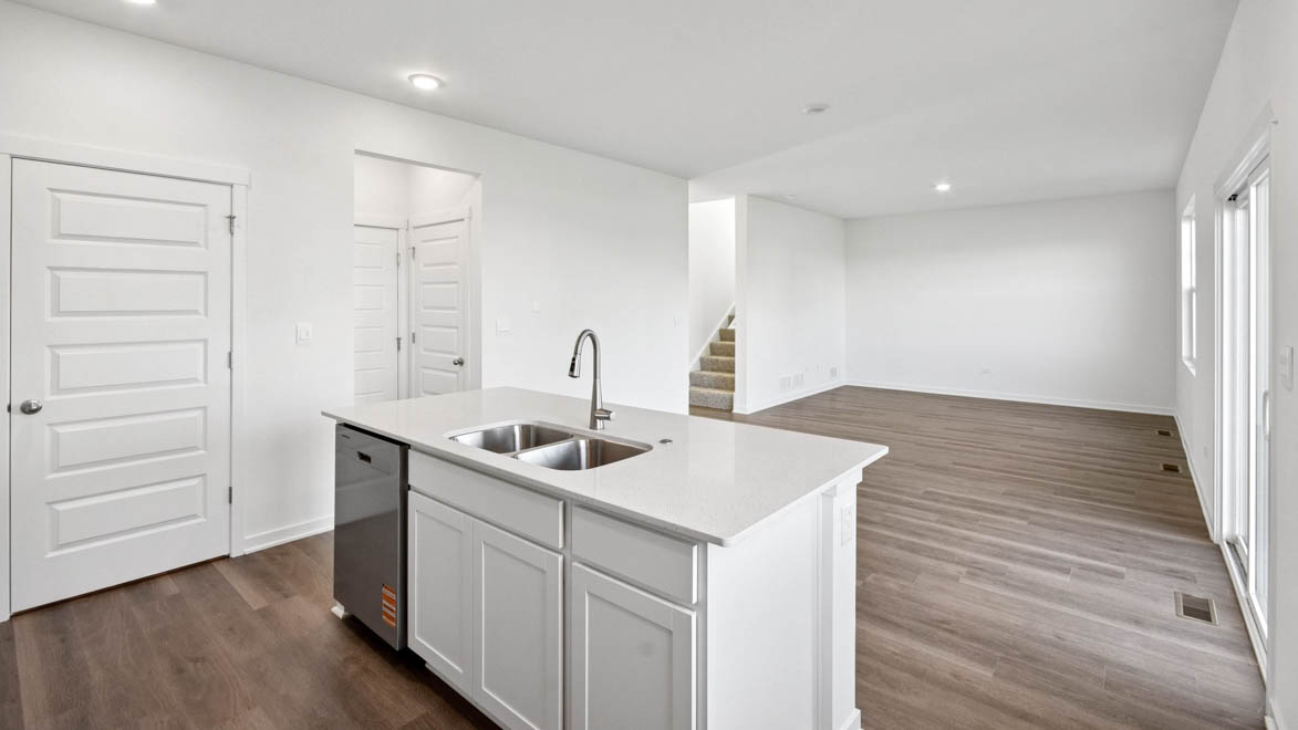 kitchen island with sink and dishwasher