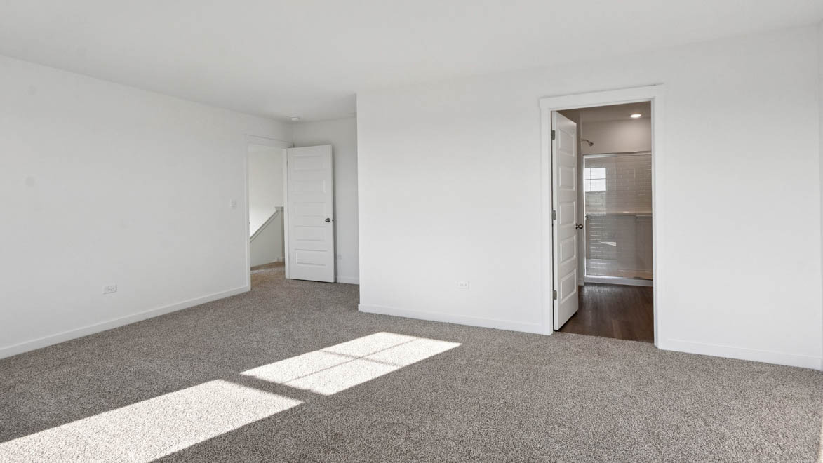 primary bedroom with connecting en suite