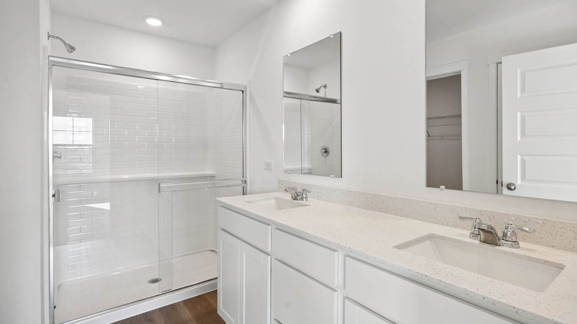 primary bathroom with dual sink