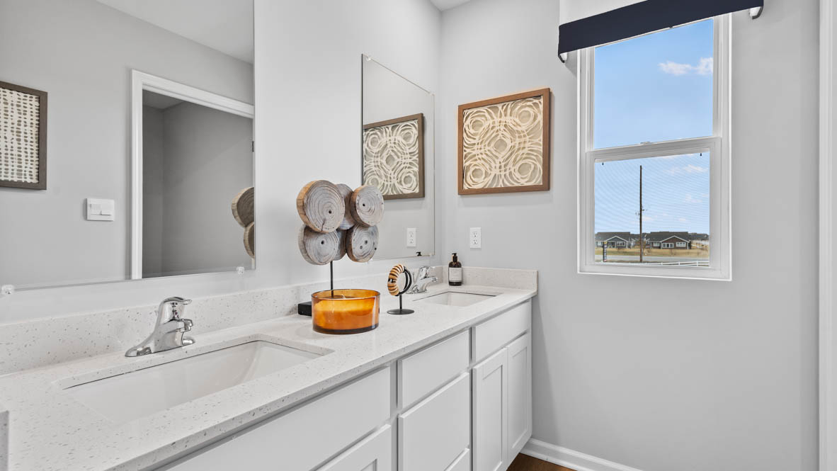 Full bathroom with dual sinks