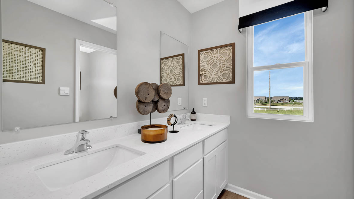 Upstairs full bathroom with duel sinks