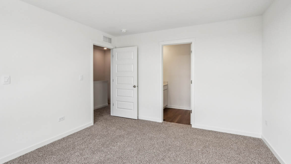 primary bedroom with connecting en suite