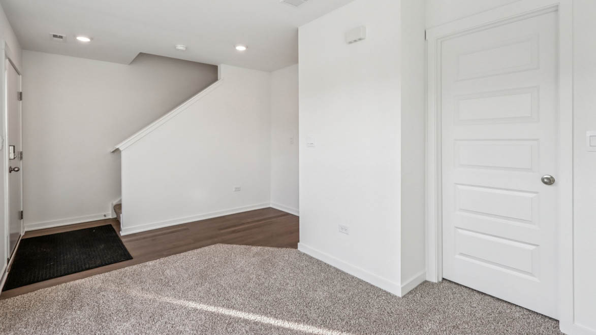 lower level flex room with a big window and spacious closet